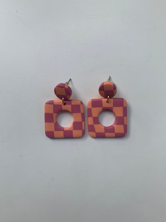 Greta cuadros naranjas y rosas