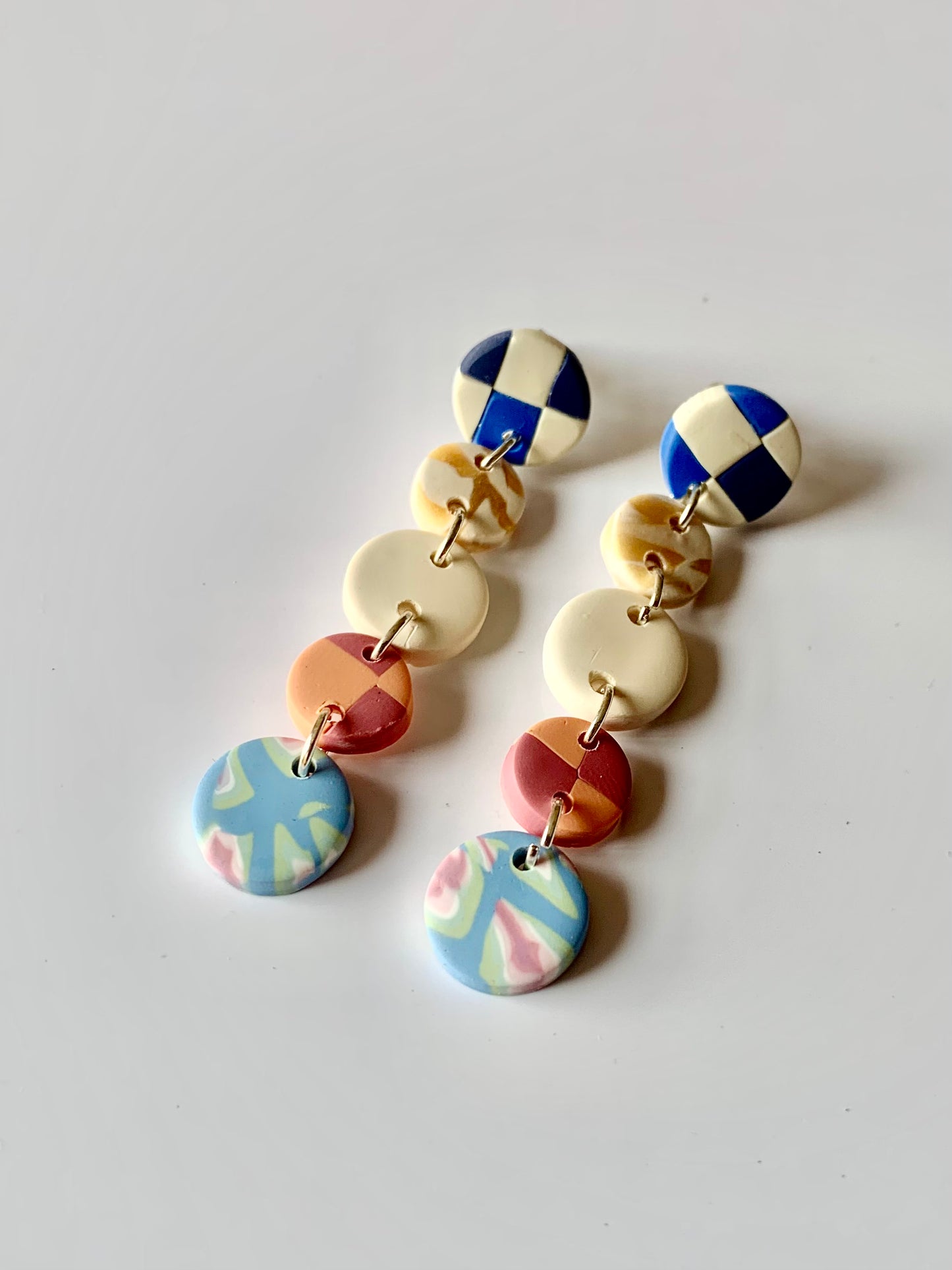 Celia cuadros hueso, azul y multicolor