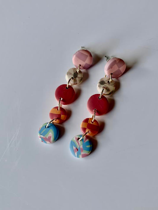 Celia cuadros rosa, morado y multicolor