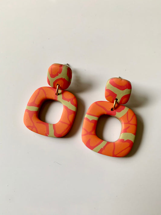 Mini Greta flores naranjas