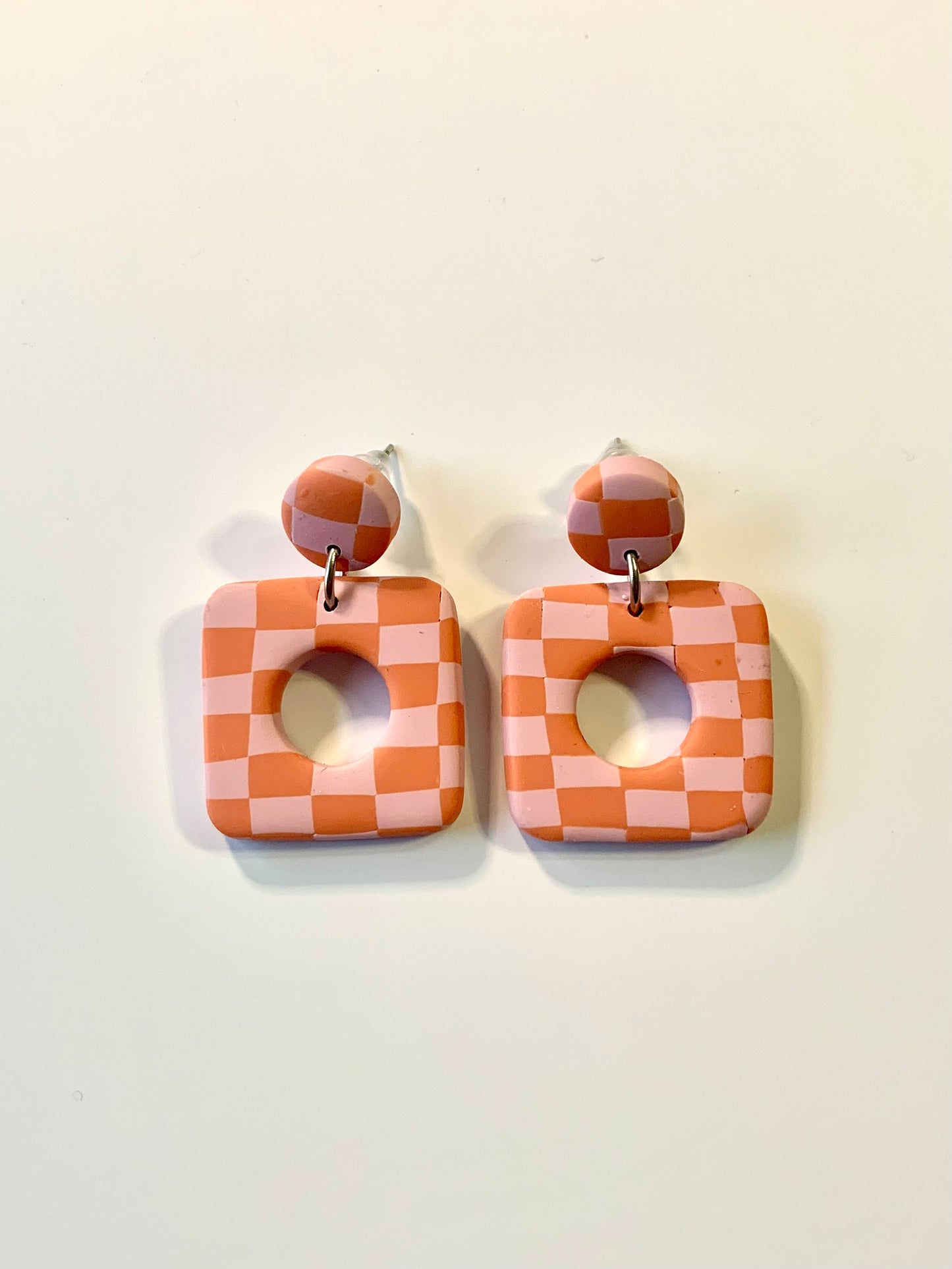 Greta cuadros naranja y rosa