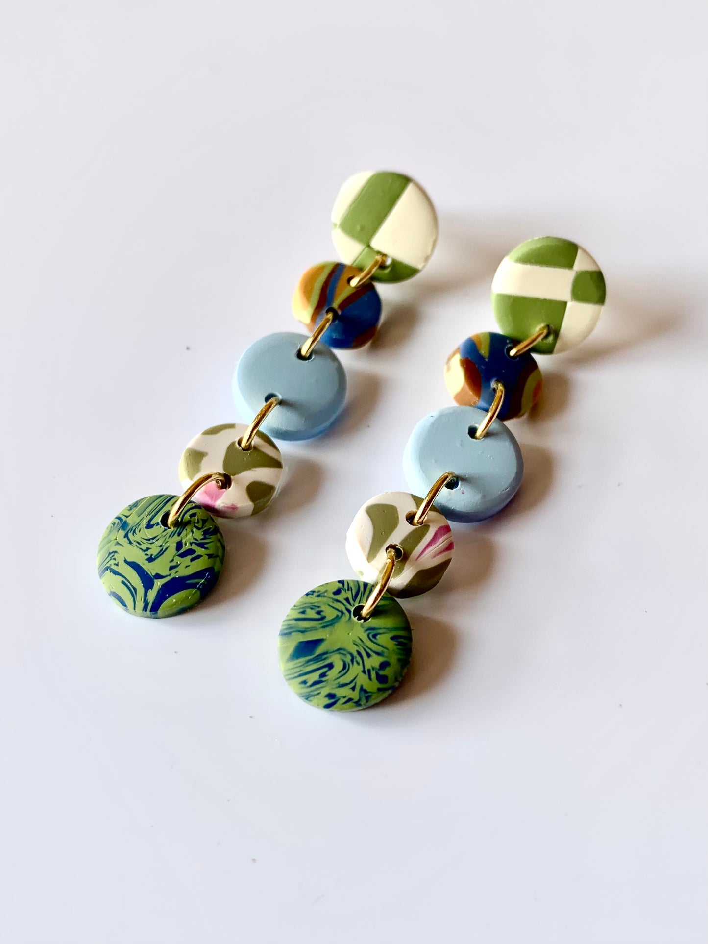 Celia cuadros hueso, verde y multicolor